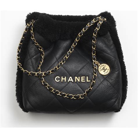 CHANEL 22 迷你手袋 光面小牛皮及金色金屬 黑色.